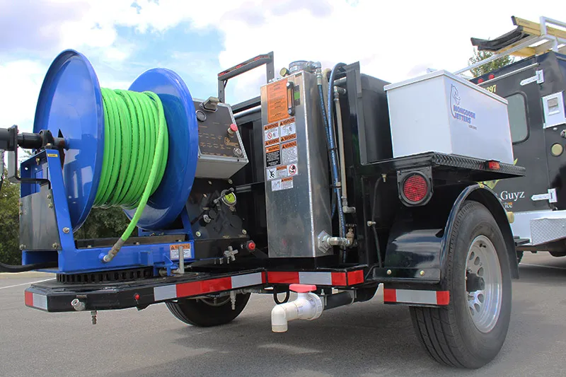 The Right Guyz hydro-jetting trailer with its high-pressure hose reel